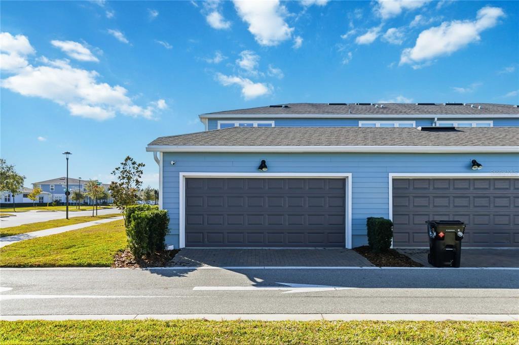 10379 Folly Beach Road Orlando, FL 32827 - Photo 45 of 54 a front view of a house with a yard