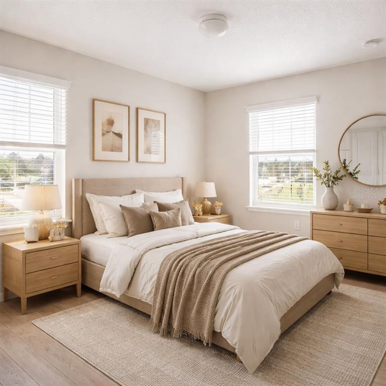 10379 Folly Beach Road Orlando, FL 32827 - Photo 6 of 56 a bedroom with bed and window