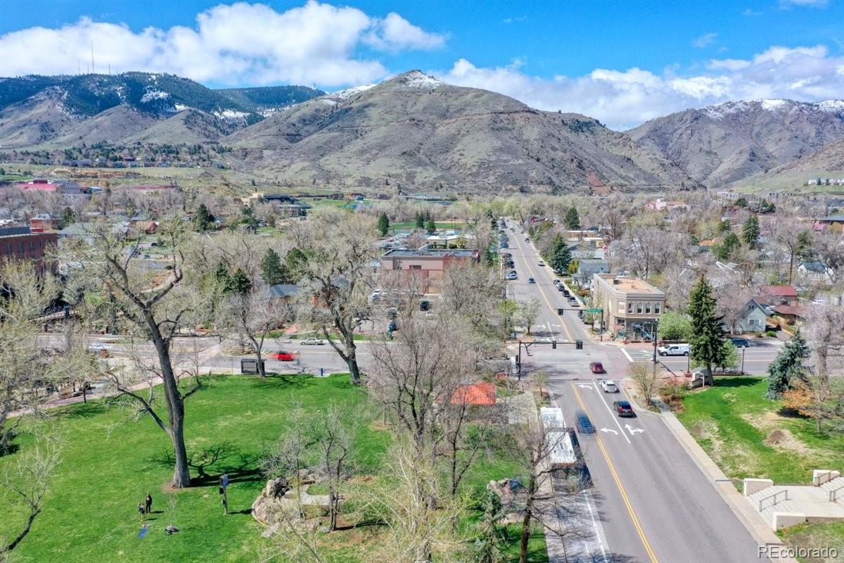 5070 Easley Road Golden, CO 80403 - Photo 11 of 24 a view of a house with a yard and a large tree