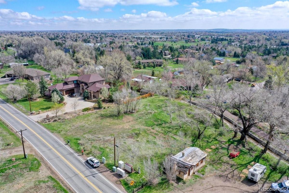 5070 Easley Road Golden, CO 80403 - Photo 10 of 24 an aerial view of a house with a yard