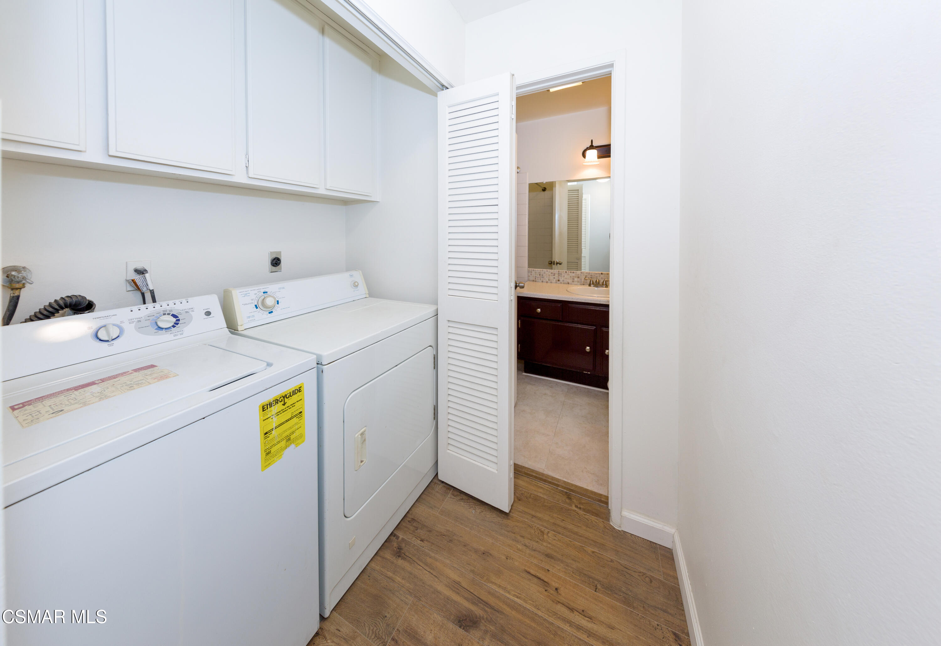 511 Spring Road, Unit 8 Moorpark, CA 93021 - Photo 11 of 17 a utility room with dryer and washer