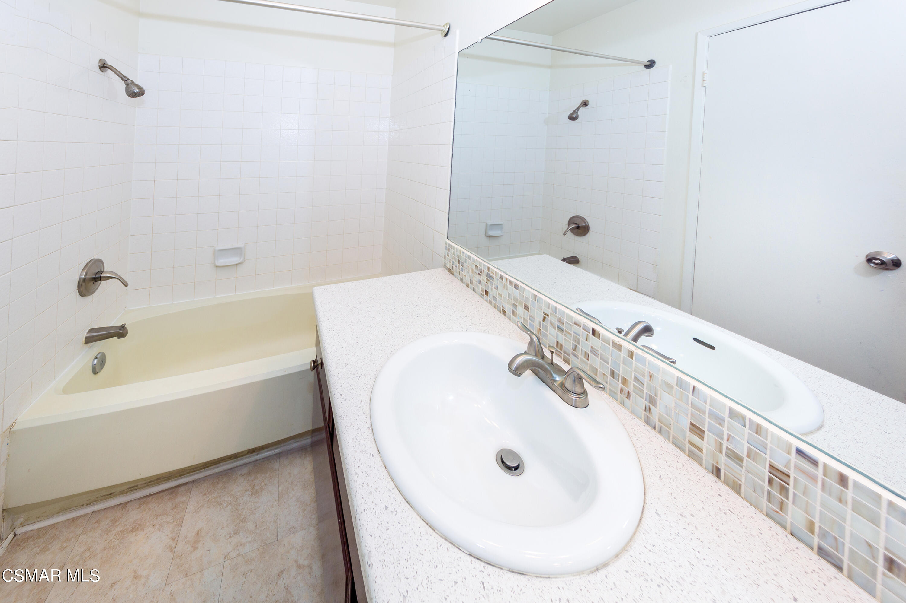 511 Spring Road, Unit 8 Moorpark, CA 93021 - Photo 14 of 17 a bathroom with a tub and a sink