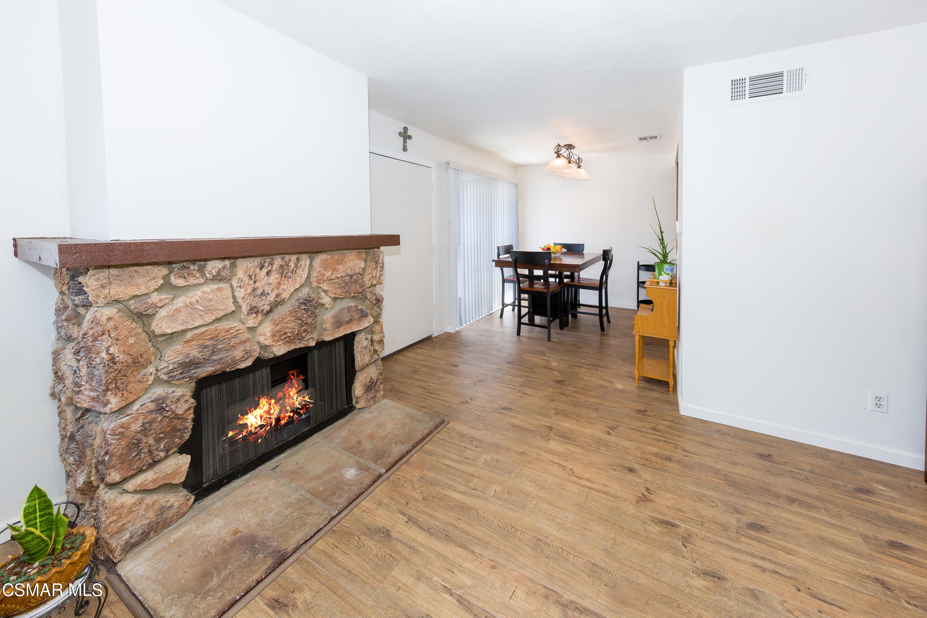 511 Spring Road, Unit 8 Moorpark, CA 93021 - Photo 5 of 17 a living room with furniture and a fireplace