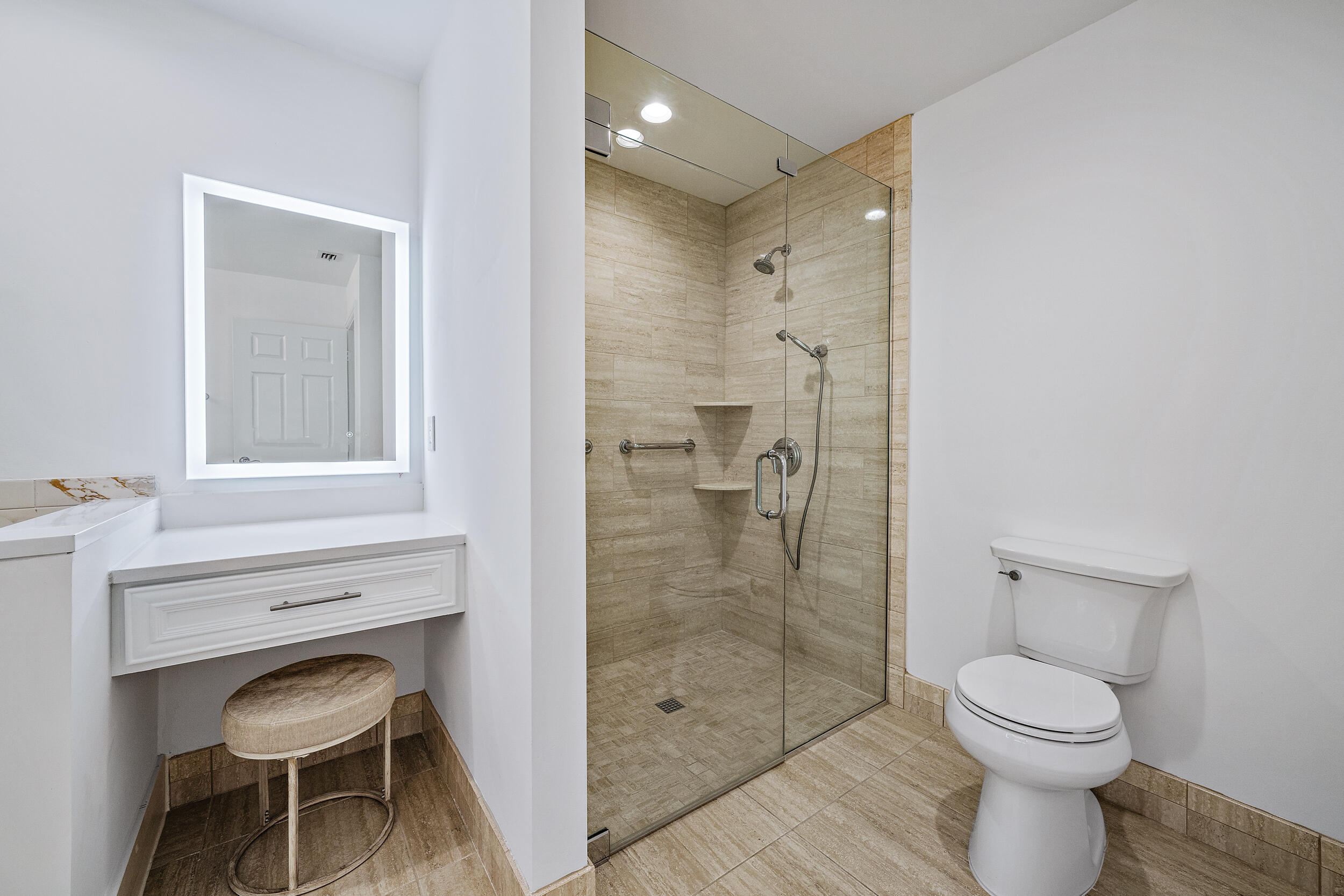 226 Eagle Drive Jupiter, FL 33477 - Photo 20 of 31 a bathroom with a toilet and a shower