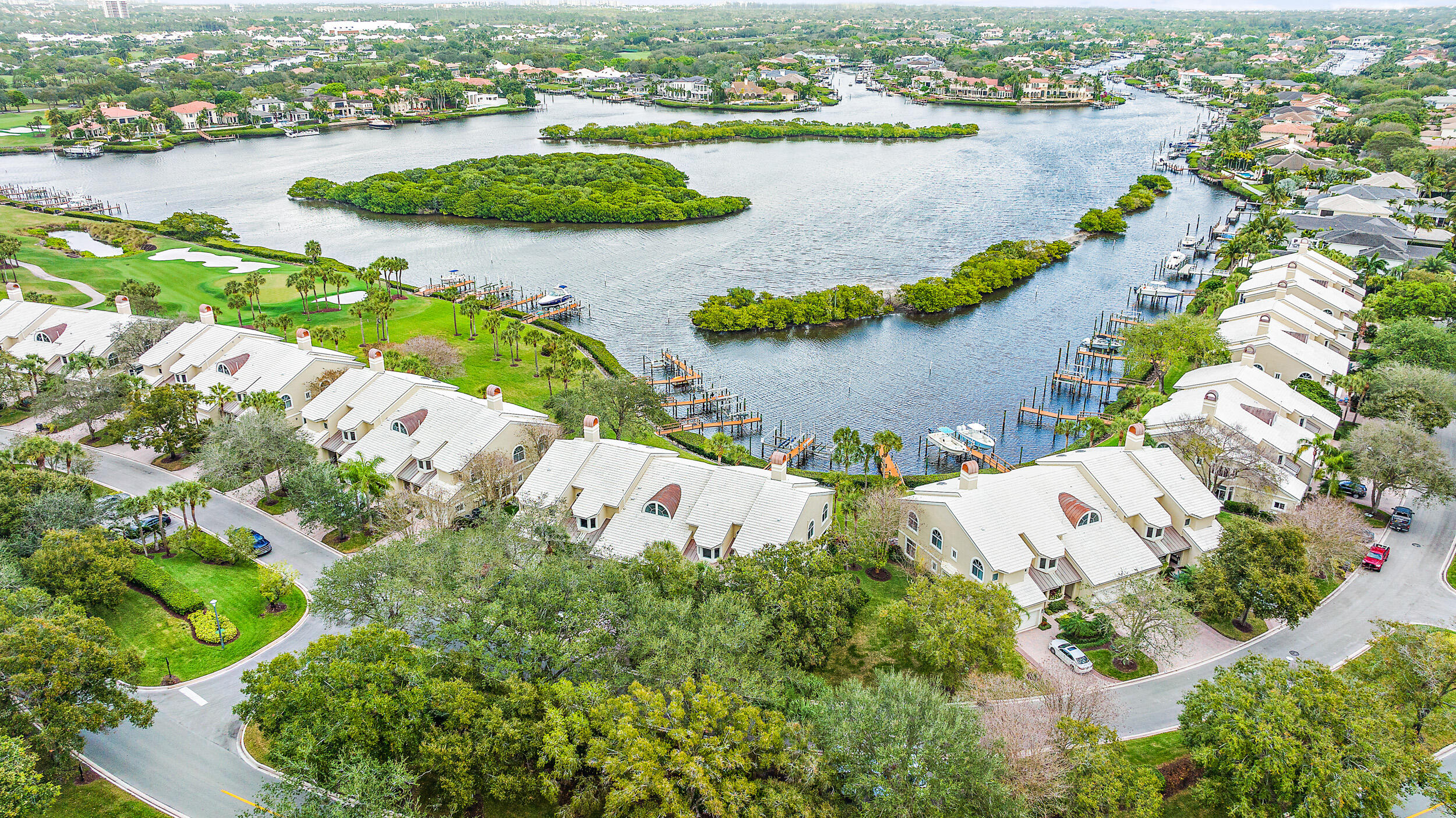 226 Eagle Drive Jupiter, FL 33477 - Photo 27 of 31 an aerial view of a house with a lake view