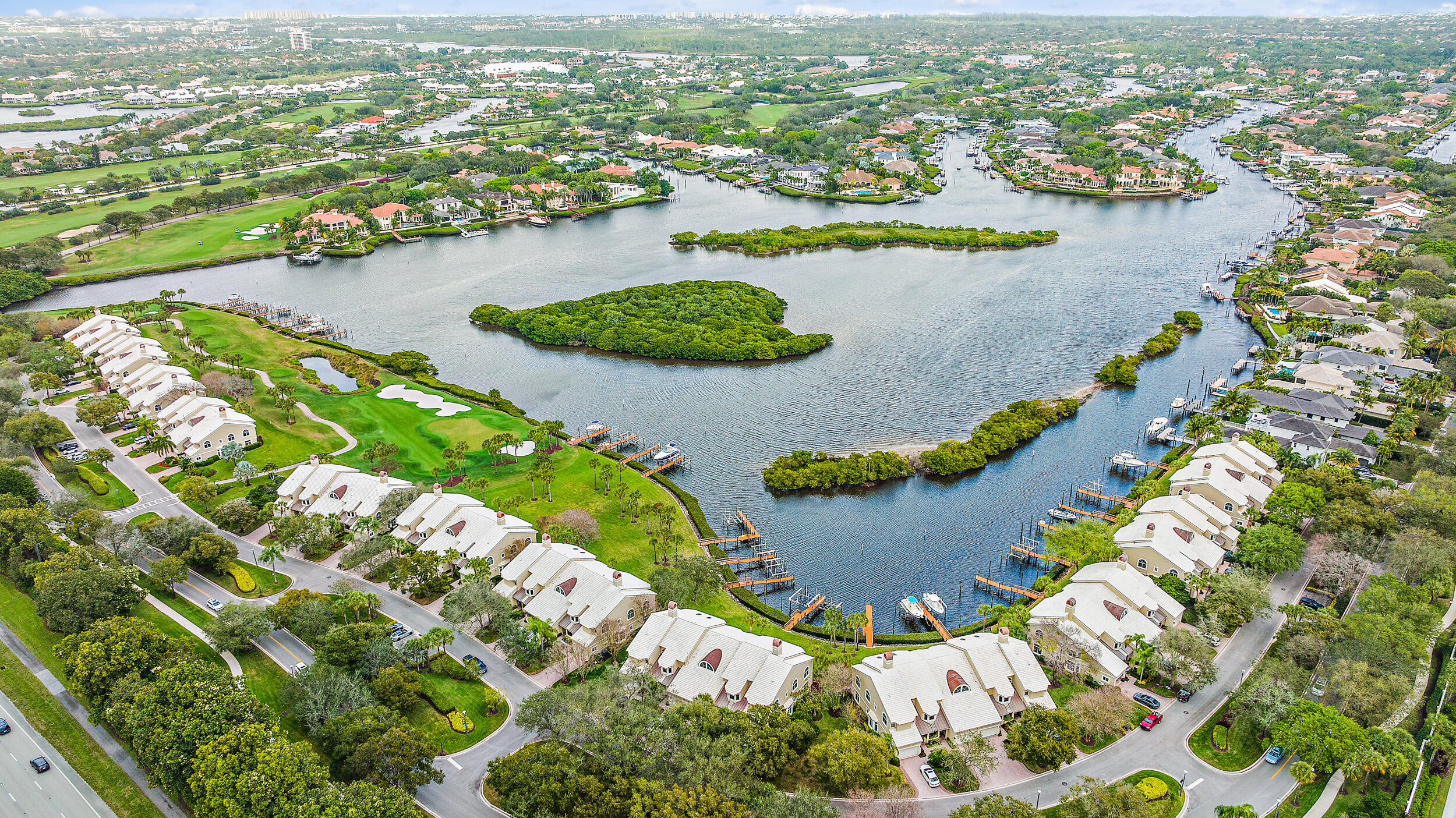 226 Eagle Drive Jupiter, FL 33477 - Photo 29 of 31 an aerial view of residential houses with outdoor space