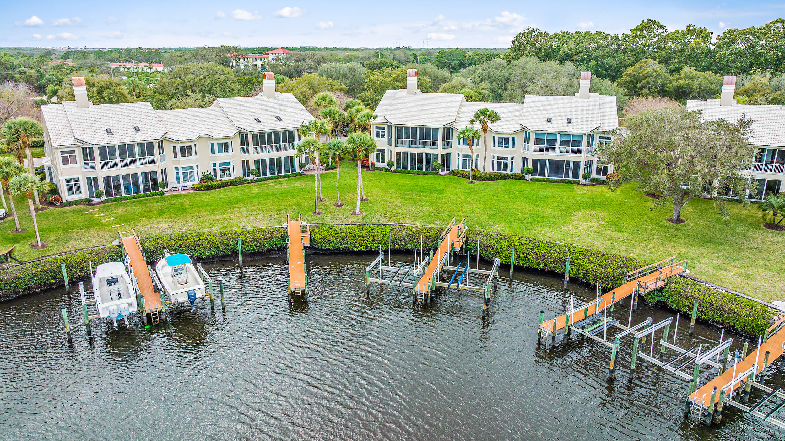 226 Eagle Drive Jupiter, FL 33477 - Photo 31 of 31 an aerial view of a house with swimming pool and garden