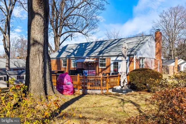 a view of swimming pool with outdoor seating