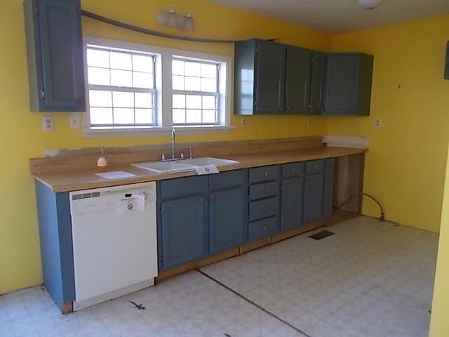 8119 Primm Springs Road Lyles, TN 37098 - Photo 4 of 12 a kitchen with a sink and cabinets