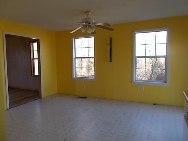 8119 Primm Springs Road Lyles, TN 37098 - Photo 5 of 12 a view of an empty room with a window