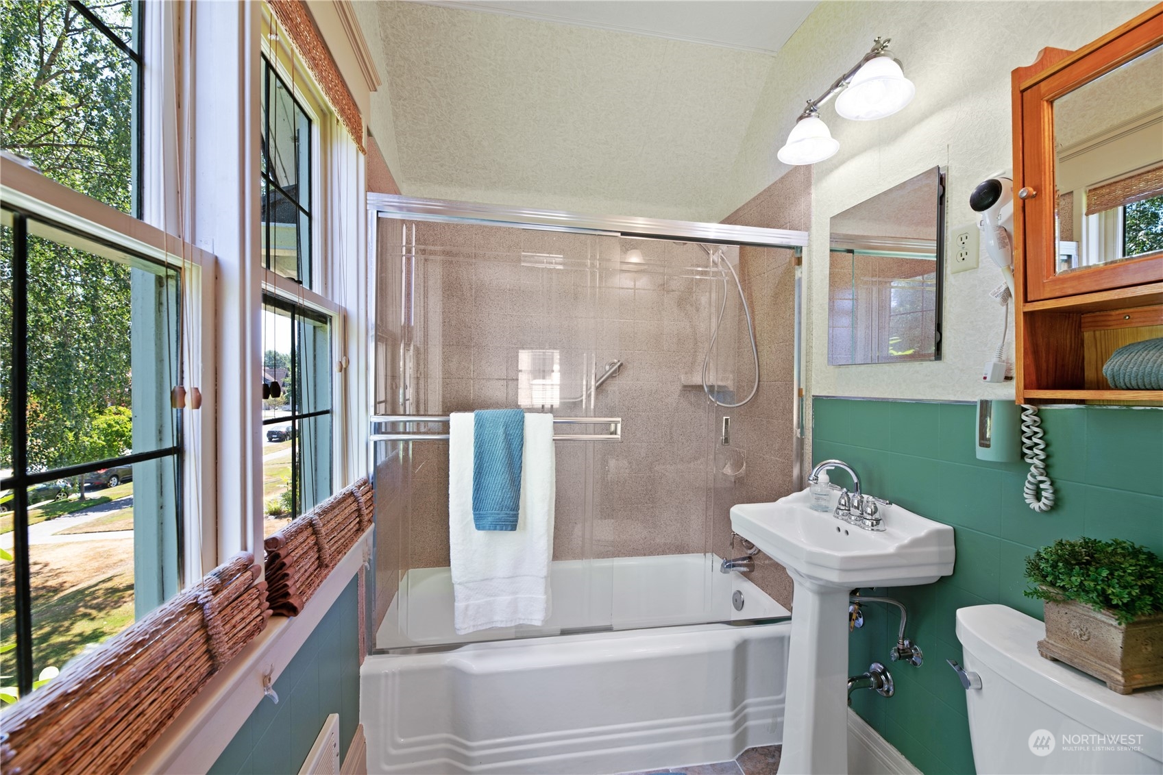 1812 Rucker Avenue Everett, WA 98201 - Photo 19 of 36 a bathroom with a bathtub shower sink and toilet