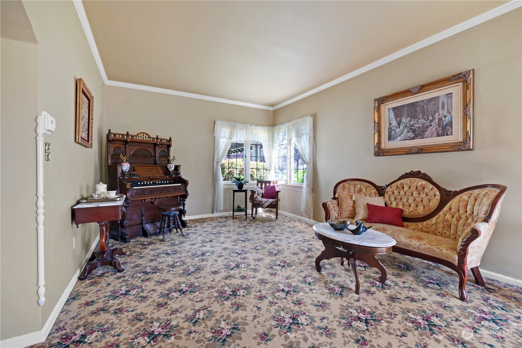 1812 Rucker Avenue Everett, WA 98201 - Photo 8 of 36 a living room with furniture a rug and a window