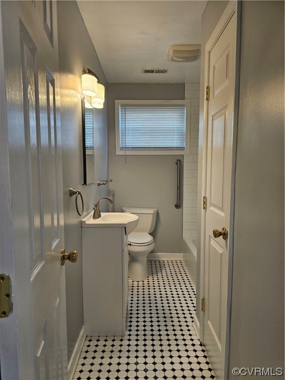 3109 Putney Road Henrico, VA 23228 - Photo 16 of 27 a bathroom with a sink a toilet and shower