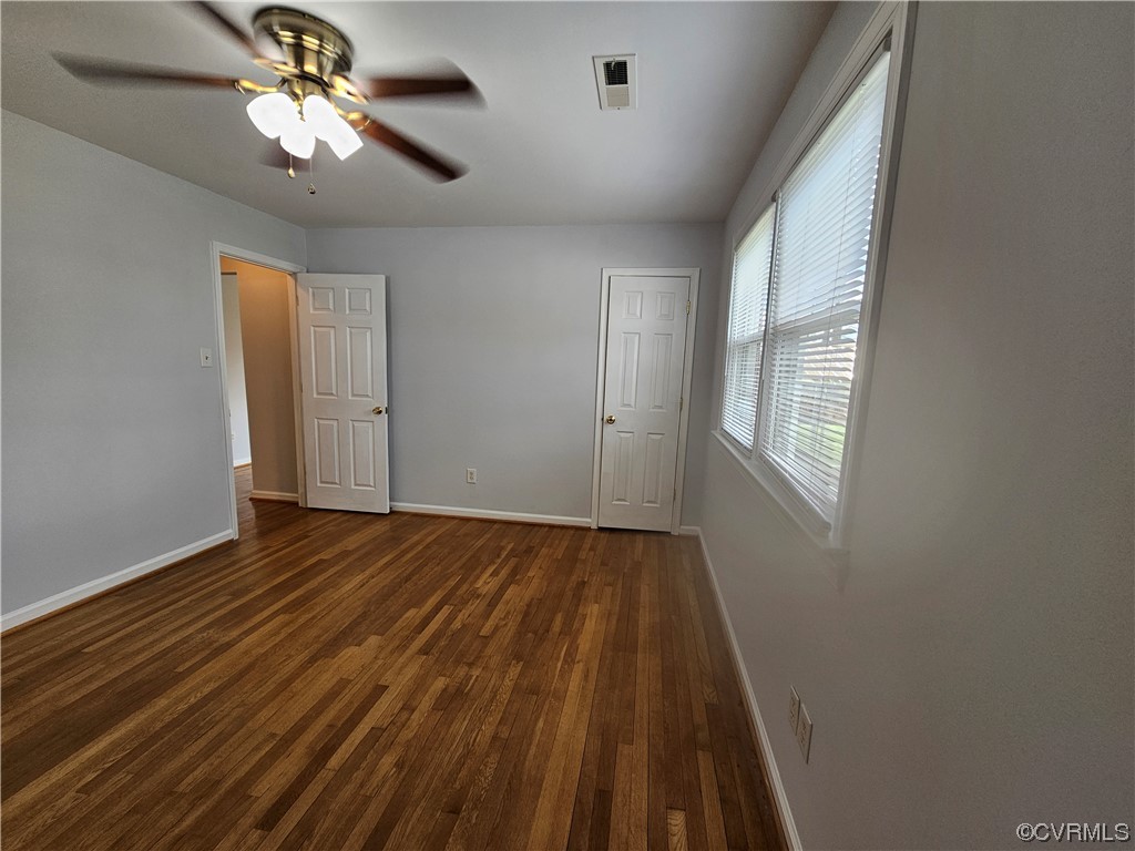 3109 Putney Road Henrico, VA 23228 - Photo 21 of 27 wooden floor in an empty room with a window