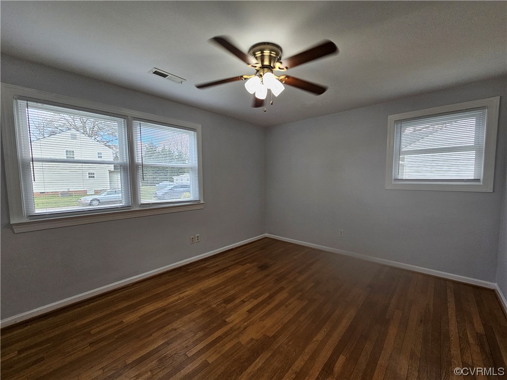 3109 Putney Road Henrico, VA 23228 - Photo 22 of 27 a view of wooden floor and chandelier fan in a room