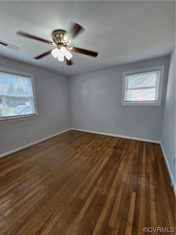 3109 Putney Road Henrico, VA 23228 - Photo 23 of 27 a view of an empty room with wooden floor and a window