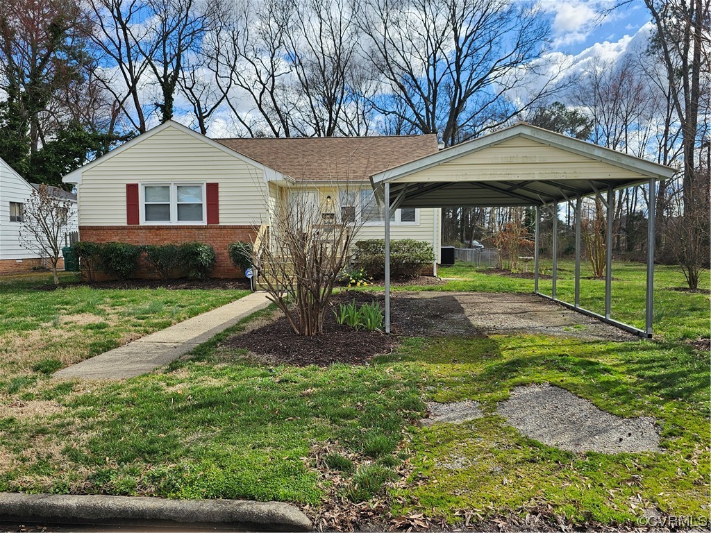 3109 Putney Road Henrico, VA 23228 - Photo 27 of 27 a front view of a house with a yard