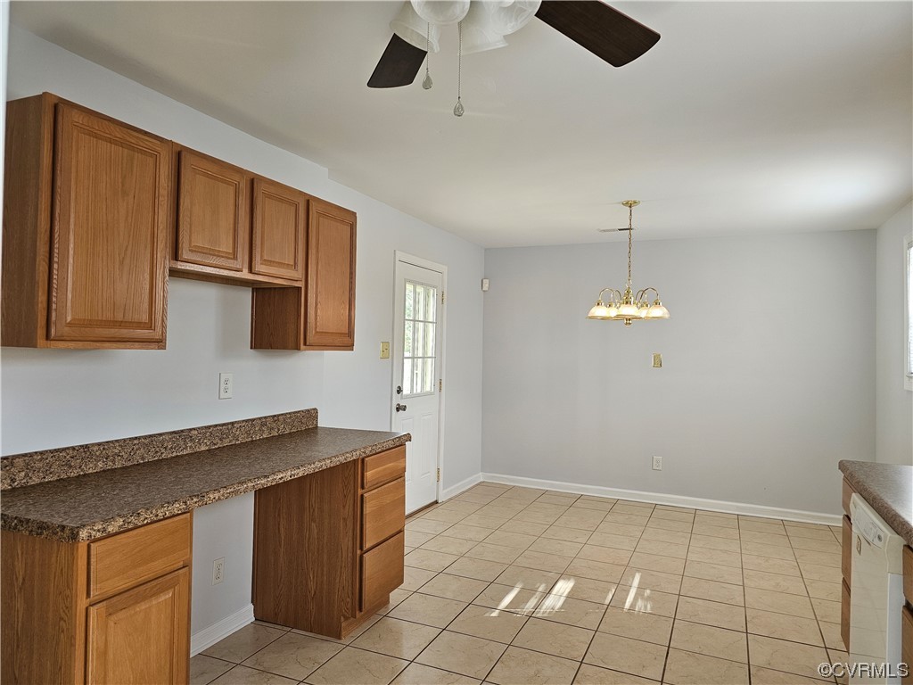 3109 Putney Road Henrico, VA 23228 - Photo 5 of 27 a kitchen with stainless steel appliances granite countertop a sink and cabinets