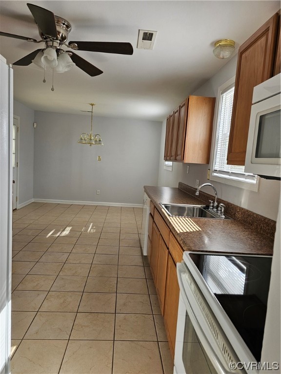 3109 Putney Road Henrico, VA 23228 - Photo 6 of 27 a kitchen with a sink appliances and cabinets
