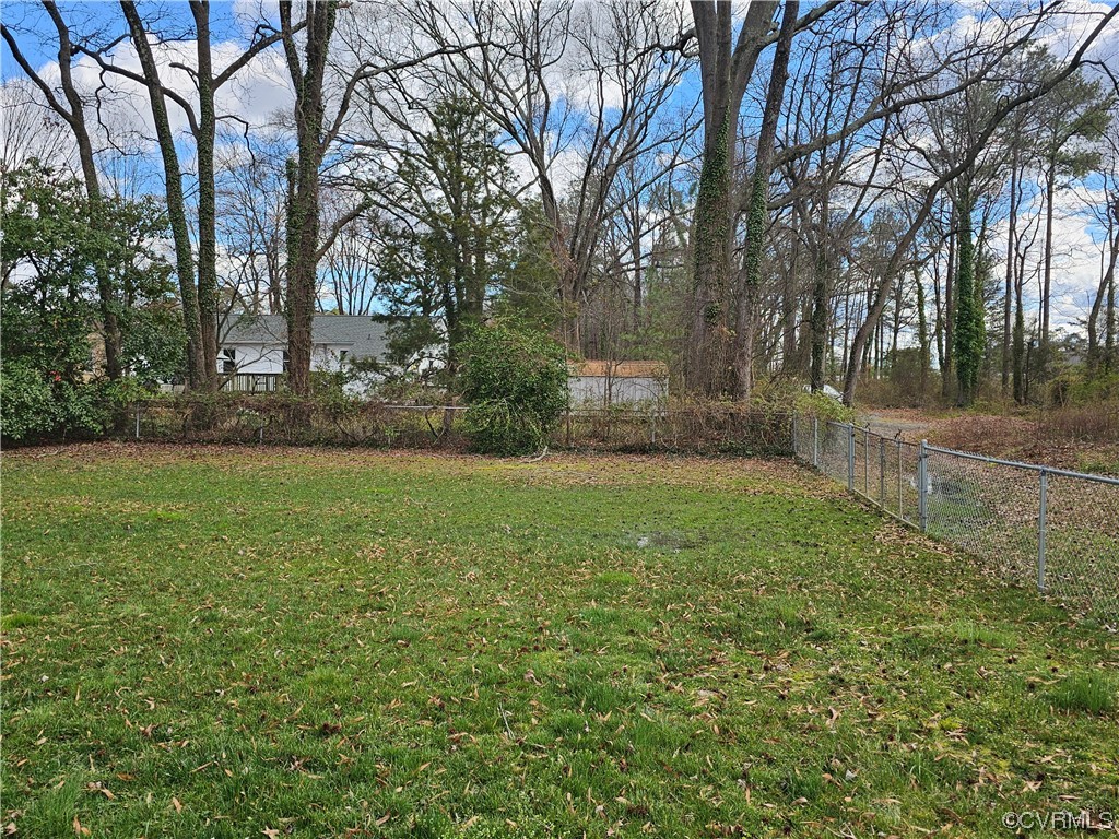 3109 Putney Road Henrico, VA 23228 - Photo 9 of 27 a view of a backyard with large trees