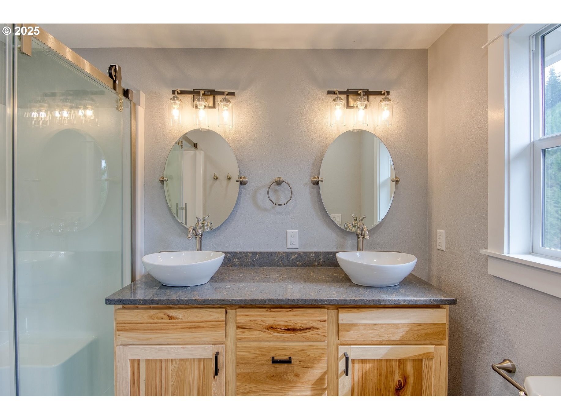 16855 Highway 42 Myrtle Point, OR 97458 - Photo 11 of 43 a bathroom with a mirror and vanity