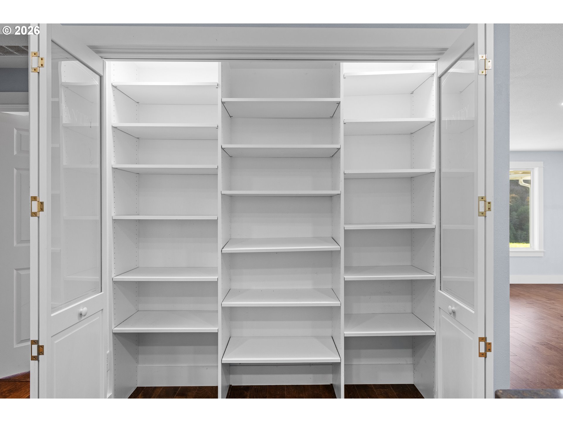 16855 Highway 42 Myrtle Point, OR 97458 - Photo 23 of 43 a view of walk in closet with empty racks