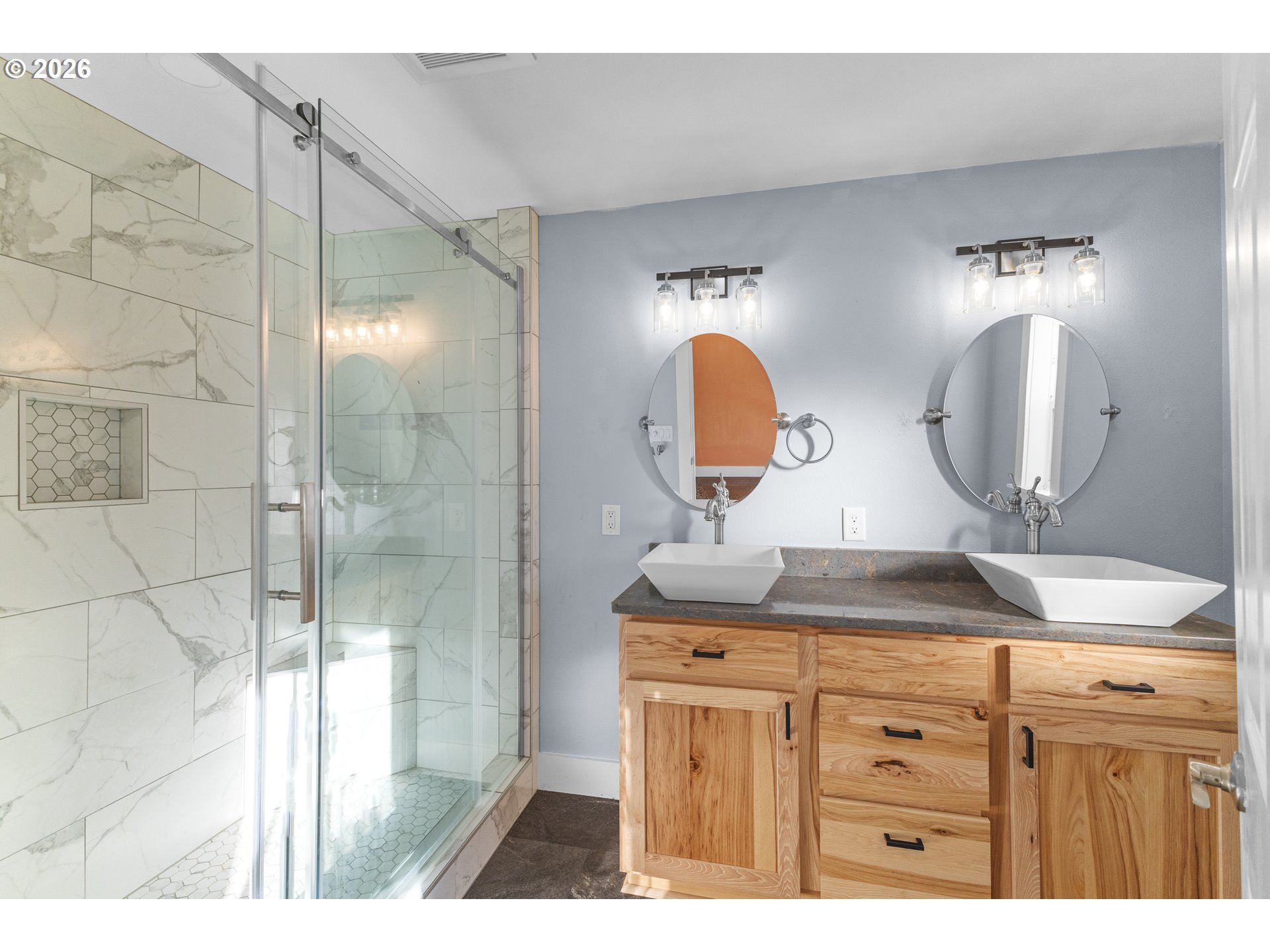 16855 Highway 42 Myrtle Point, OR 97458 - Photo 29 of 43 a bathroom with a granite countertop sink a mirror and shower
