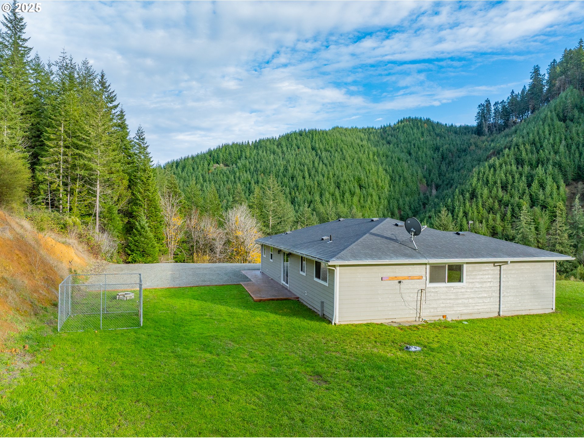 16855 Highway 42 Myrtle Point, OR 97458 - Photo 38 of 43 a view of a house with a yard