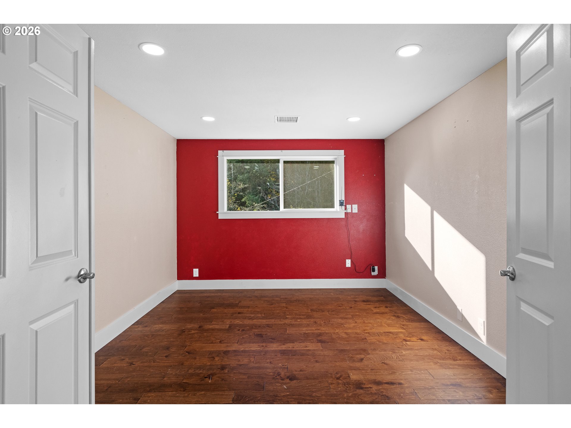 16855 Highway 42 Myrtle Point, OR 97458 - Photo 8 of 43 a view of an empty room with a window