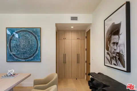 a bedroom with a bed and furniture