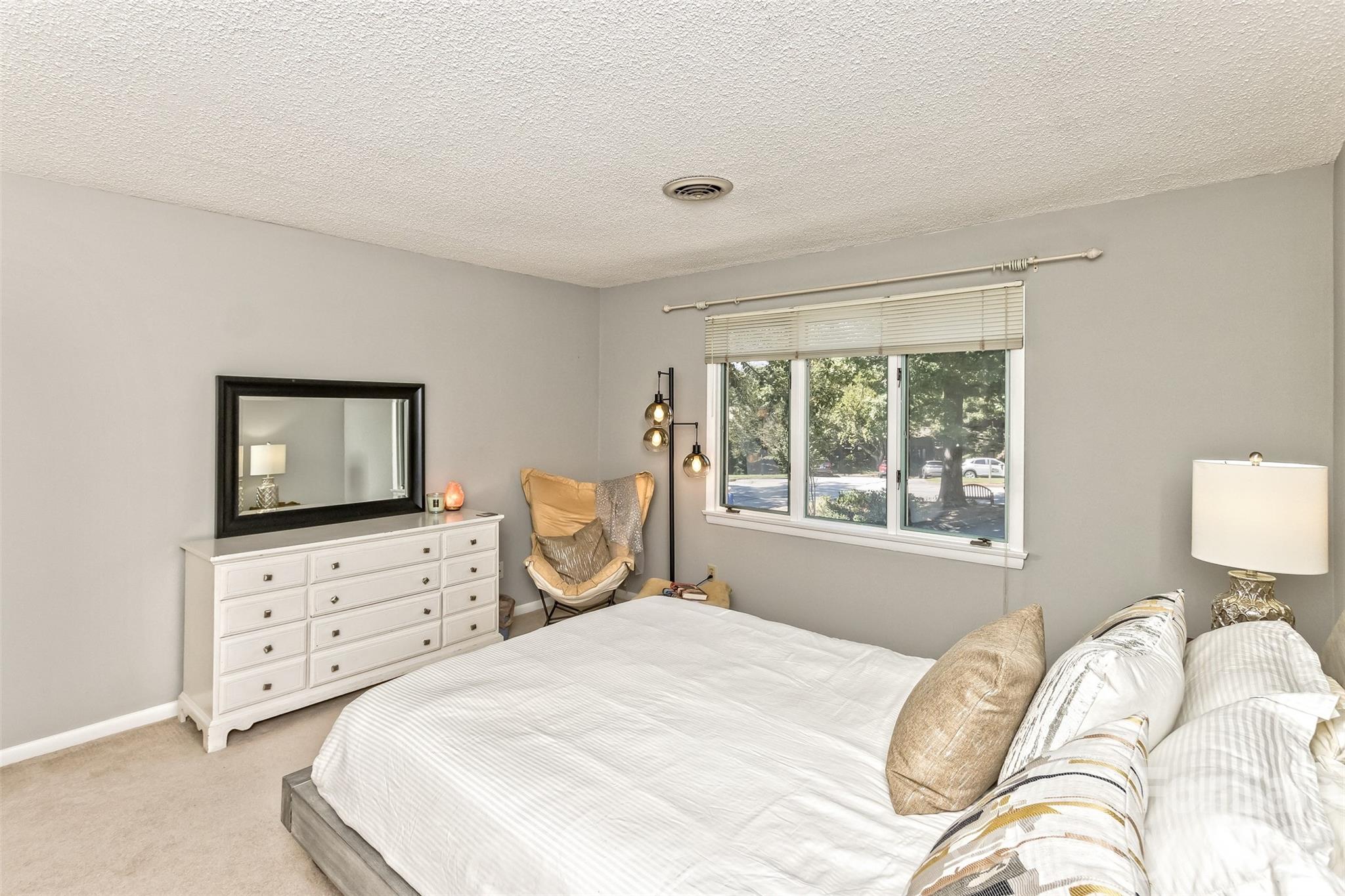 503 Crowfields Lane Asheville, NC 28803 - Photo 24 of 41 a bedroom with a bed and window