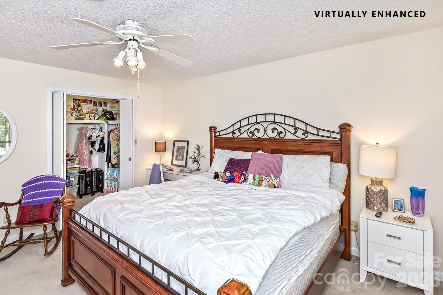 503 Crowfields Lane Asheville, NC 28803 - Photo 25 of 41 a bedroom with a bed a chandelier and dresser