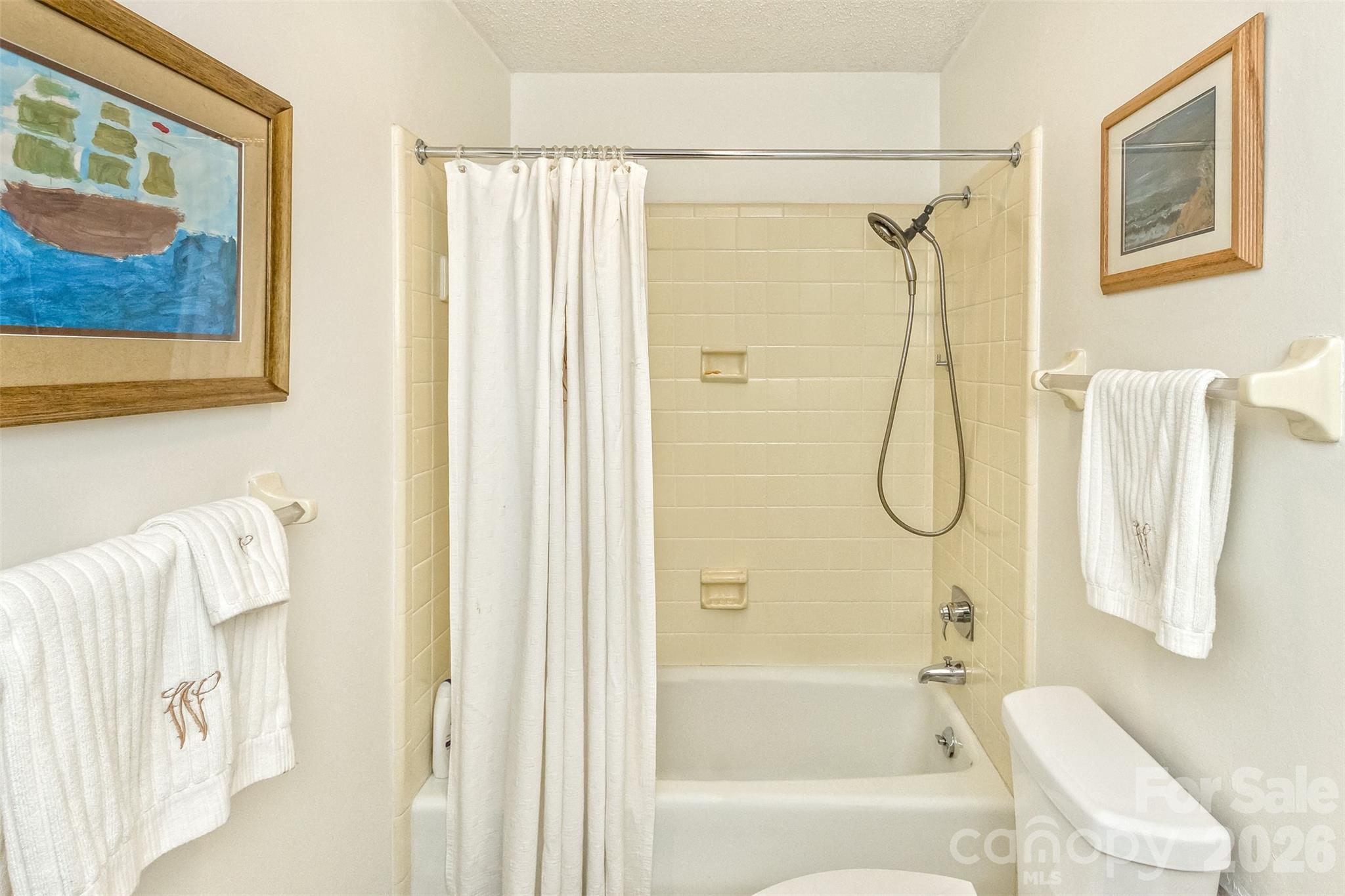 503 Crowfields Lane Asheville, NC 28803 - Photo 28 of 41 a bathroom with a bath tub and a shower