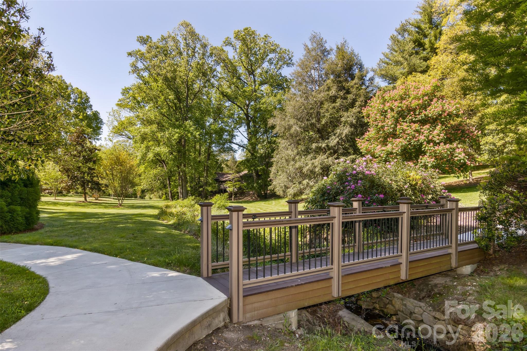 503 Crowfields Lane Asheville, NC 28803 - Photo 33 of 41 a view of a yard with wooden fence