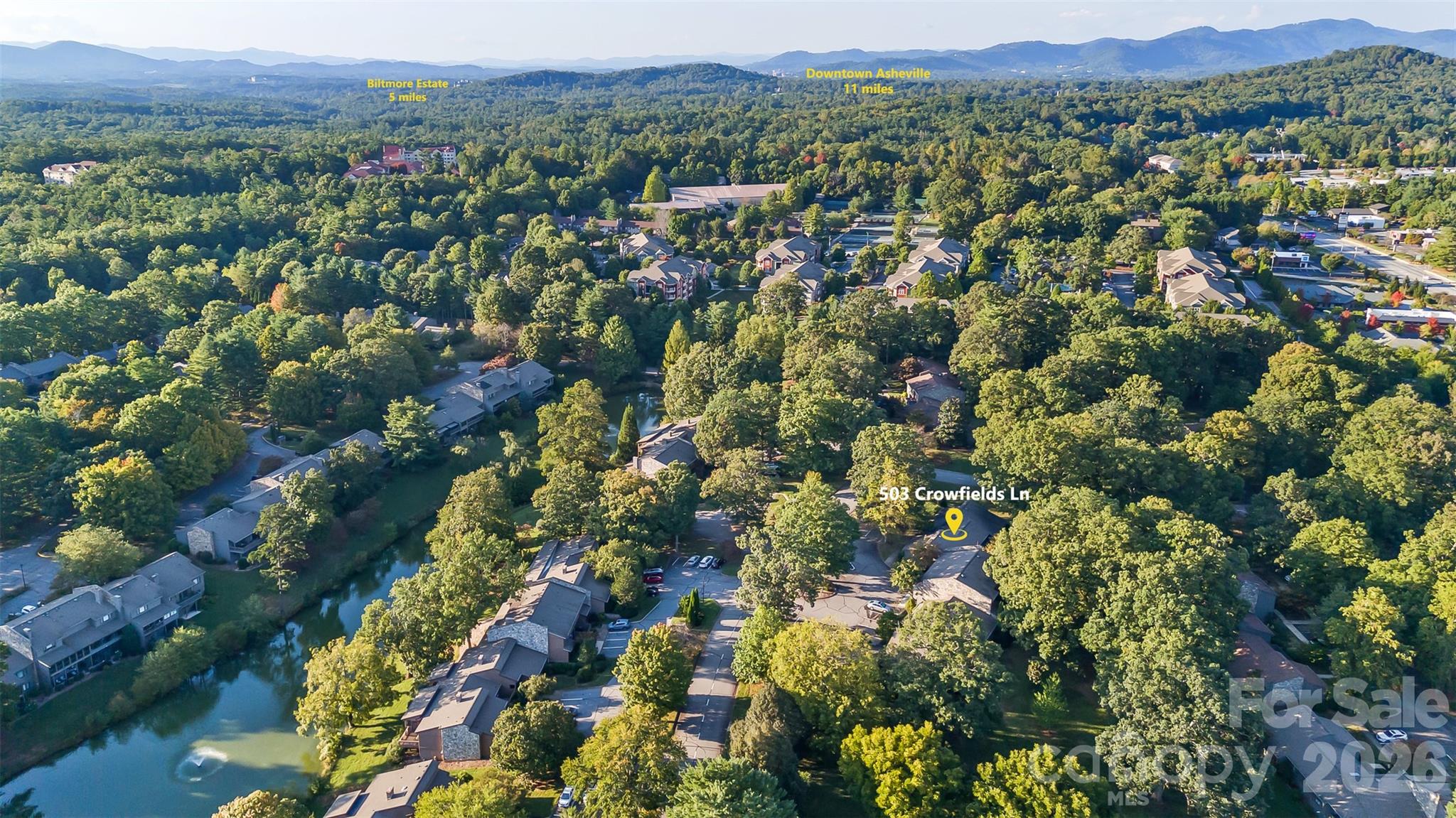 503 Crowfields Lane Asheville, NC 28803 - Photo 36 of 41 a view of a city with mountain