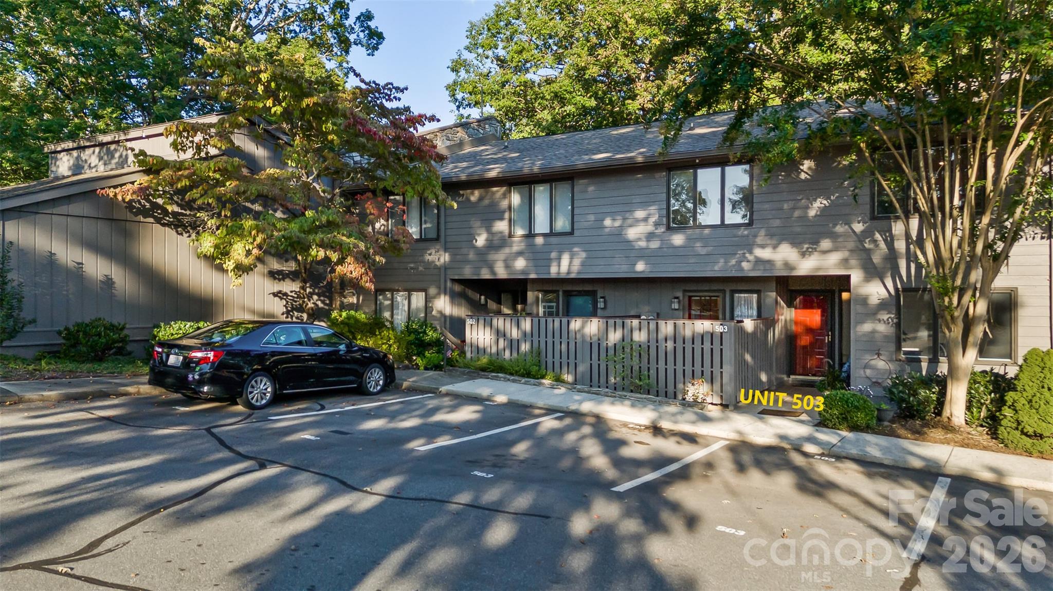 503 Crowfields Lane Asheville, NC 28803 - Photo 38 of 41 a view of a car park in front of a house