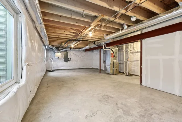 a view of a room with wooden walls