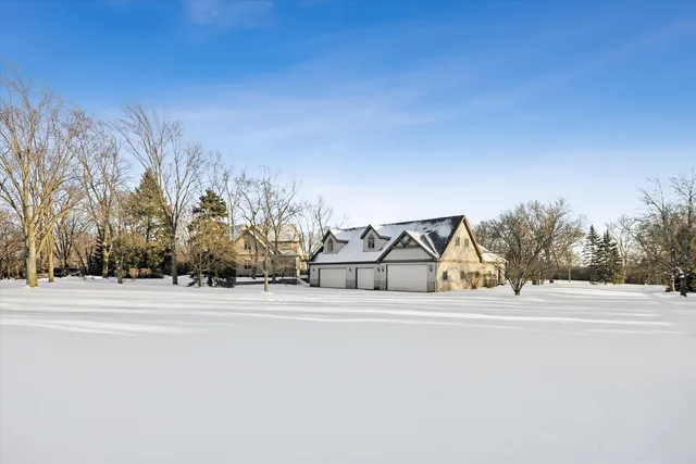 a view of a house with a swimming pool