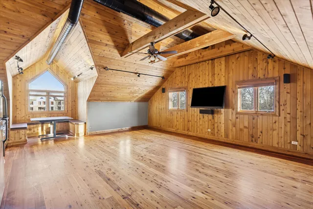 a view of a livingroom with furniture and window