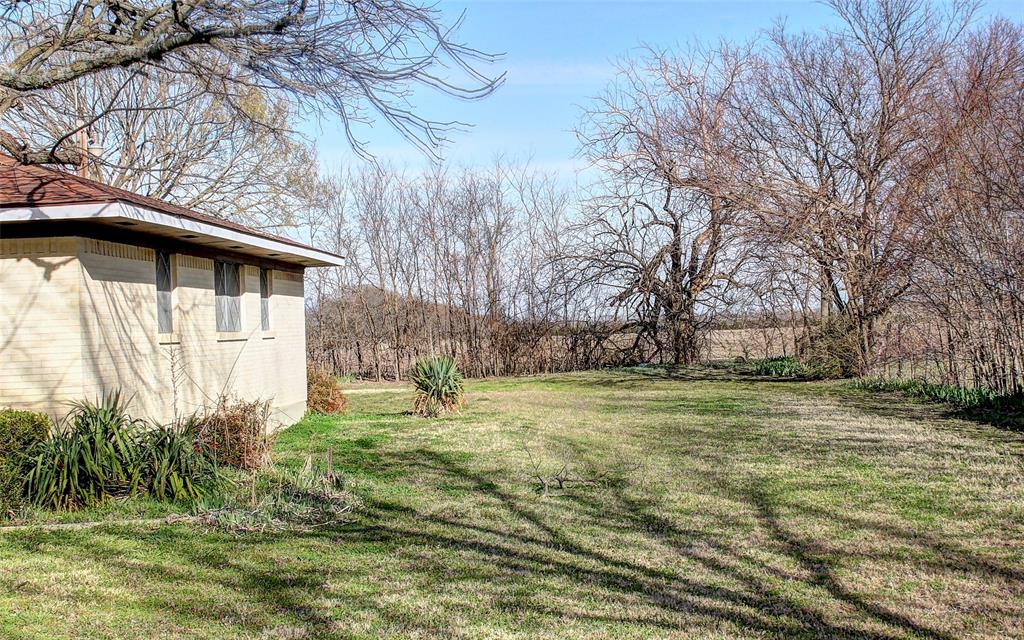 512 North Sherley Road Anna, TX 75409 - Photo 16 of 20 a fire hydrant in the middle of a field
