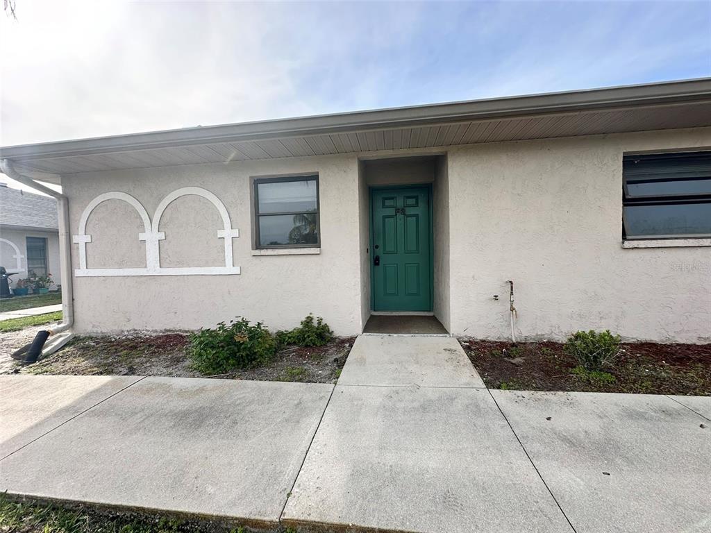 24540 Harbor View Road, Unit F2 Port Charlotte, FL 33980 - Photo 1 of 14