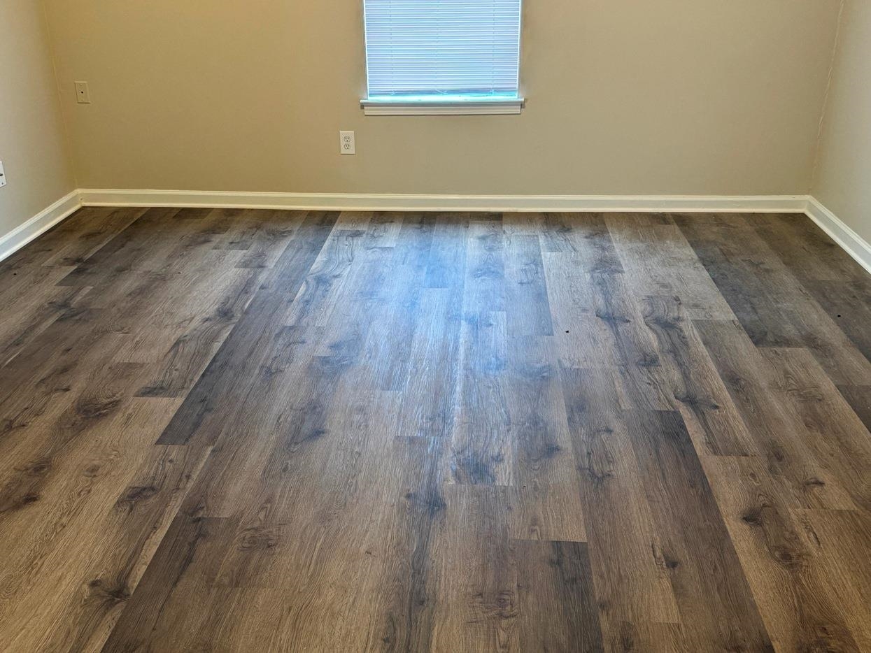 6012 Chadwell Road Millington, TN 38053 - Photo 8 of 15 Spare room featuring dark hardwood / wood-style floors