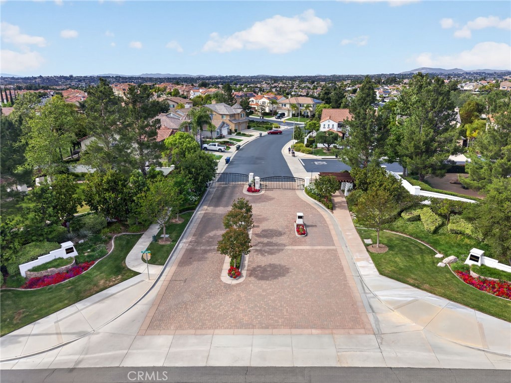 45136 Willowick Street Temecula, CA 92592 - Photo 67 of 75 an aerial view of a house with a yard basket ball court and outdoor seating