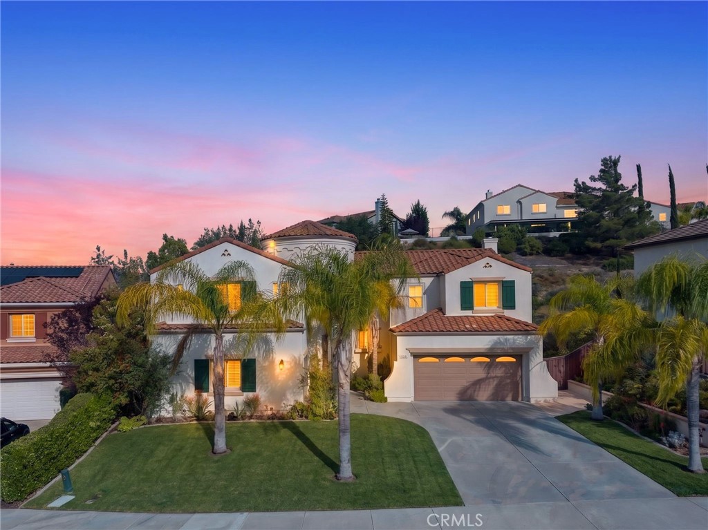 45136 Willowick Street Temecula, CA 92592 - Photo 73 of 75 a view of a house with a yard and potted plants