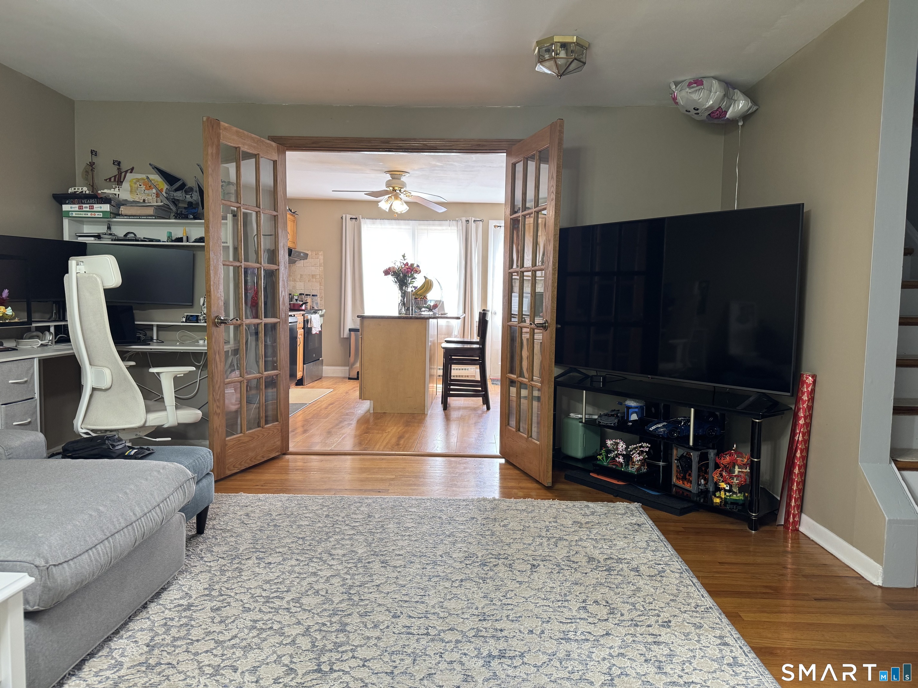 480 Radmere Road, Unit B Cheshire, CT 06410 - Photo 6 of 13 a living room with furniture and a flat screen tv