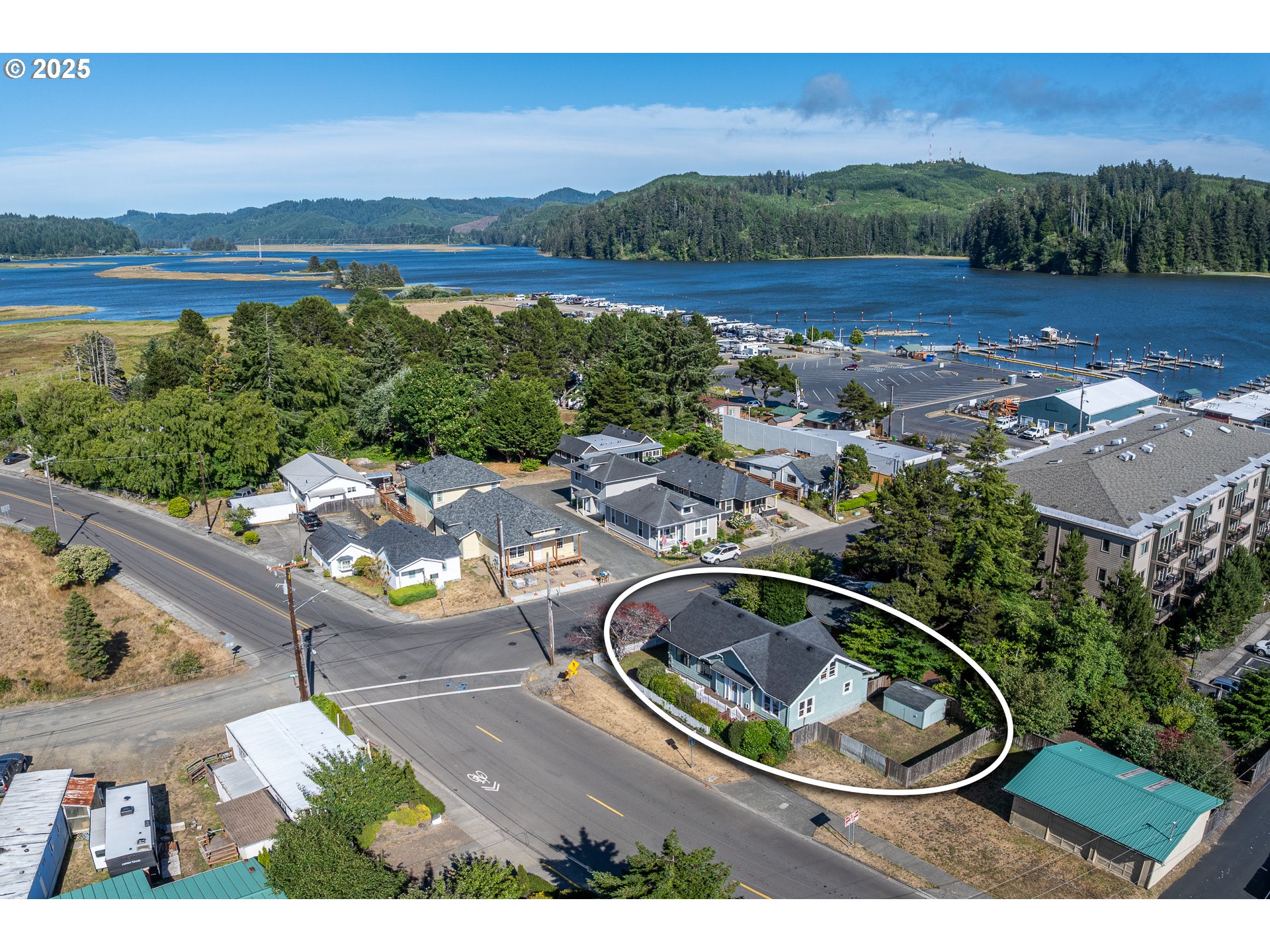 289 Harbor Street Florence, OR 97439 - Photo 2 of 47 an aerial view of a house with outdoor space
