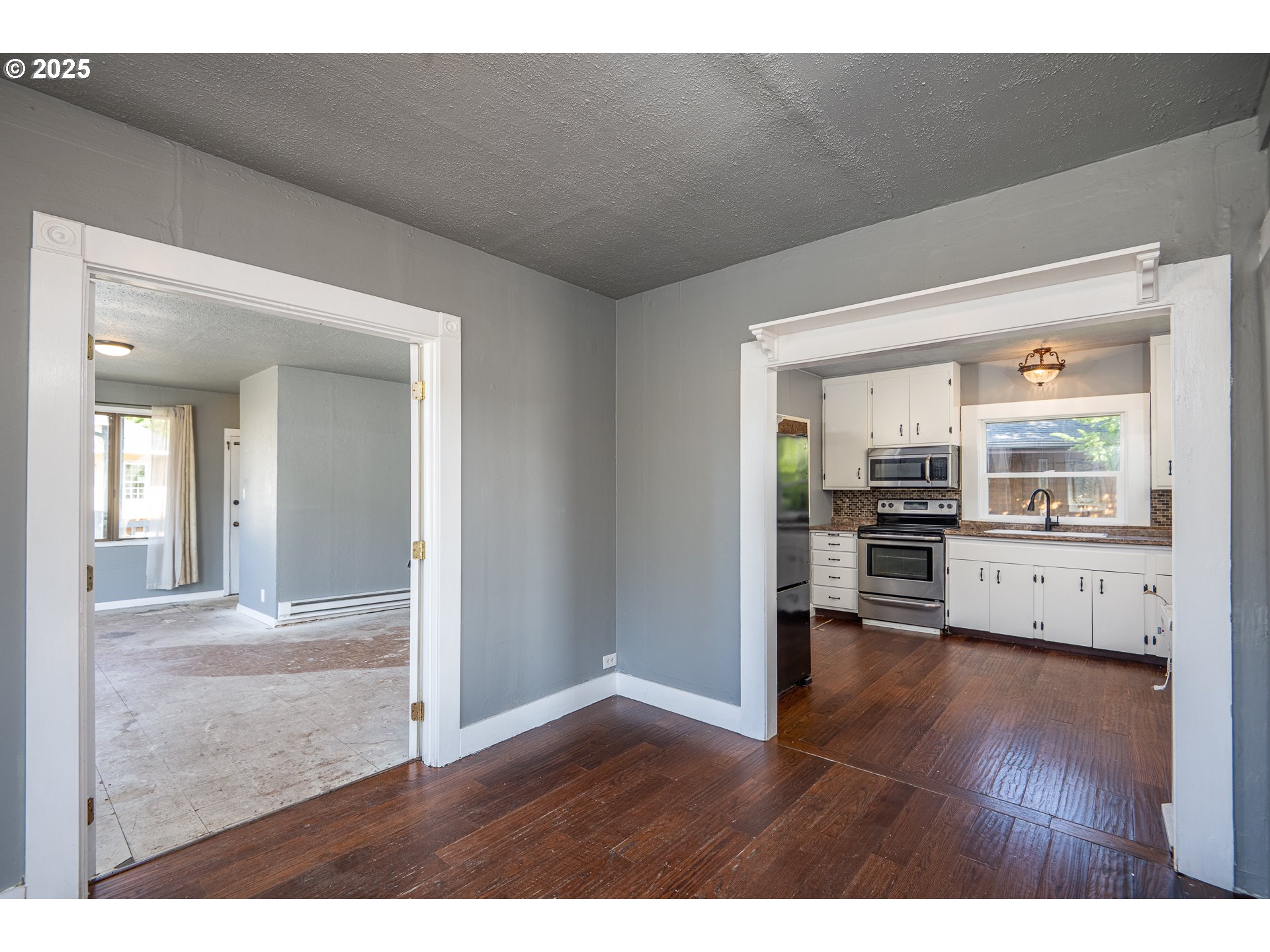 289 Harbor Street Florence, OR 97439 - Photo 21 of 47 a view of empty room with wooden floor