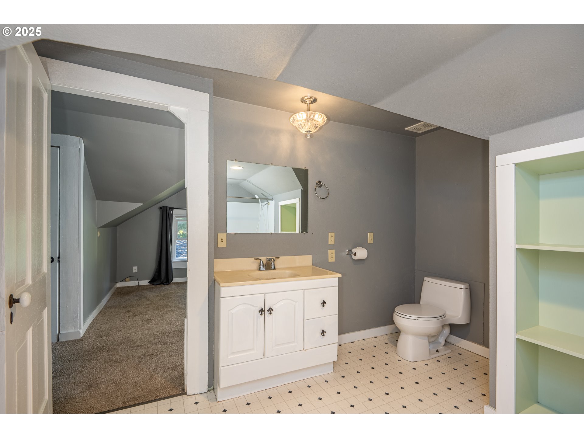 289 Harbor Street Florence, OR 97439 - Photo 35 of 47 a bathroom with a sink a toilet and a mirror