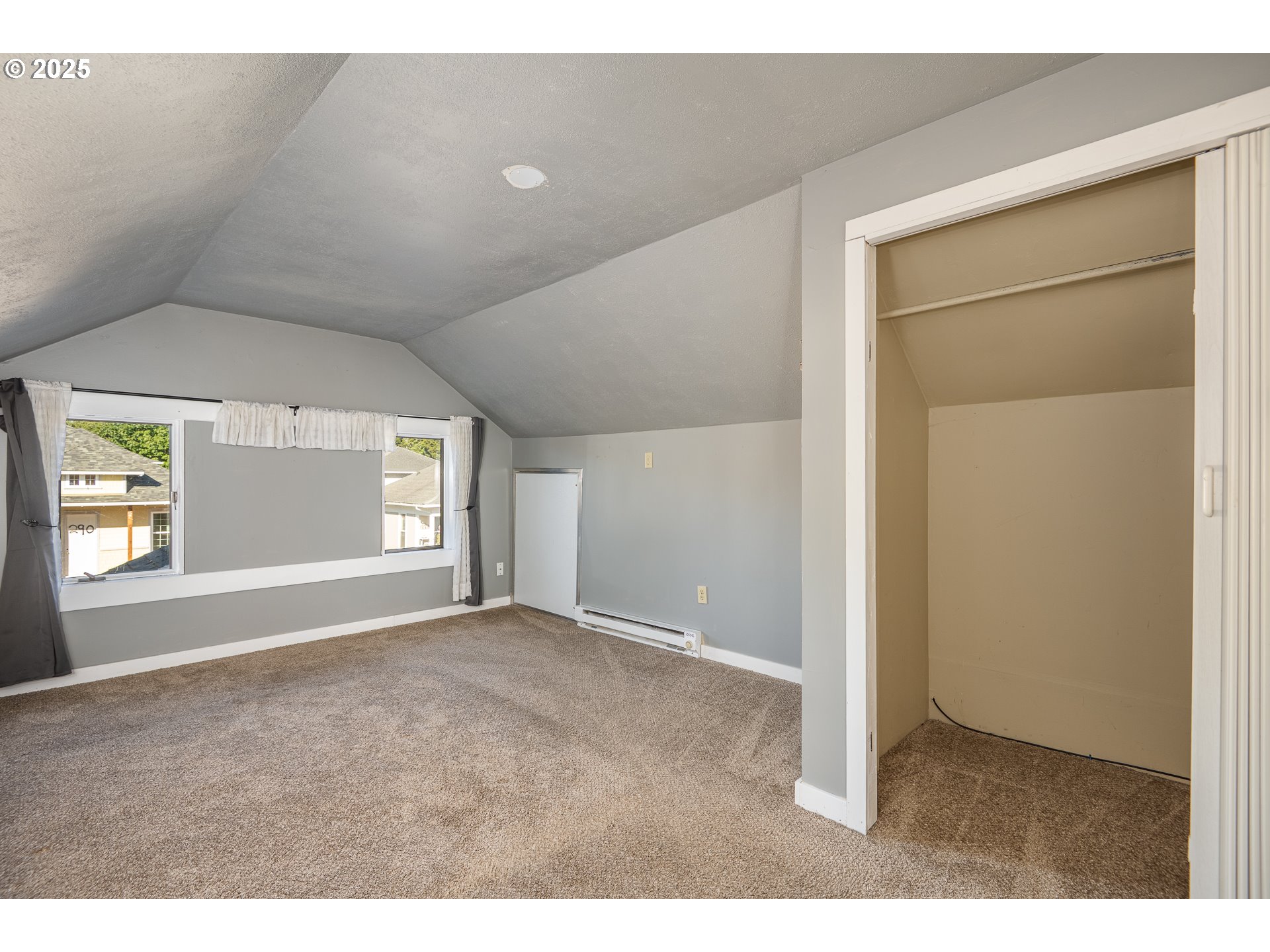 289 Harbor Street Florence, OR 97439 - Photo 37 of 47 a view of an empty room with a window