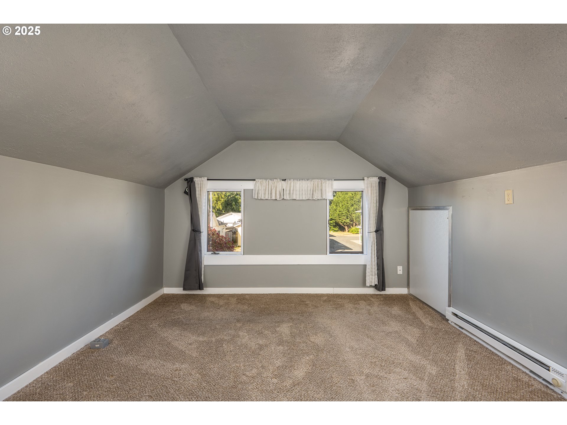289 Harbor Street Florence, OR 97439 - Photo 38 of 47 an empty room with windows